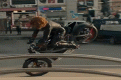 WATCH SCARLETT JOHANSSON IN LEATHER CATSUIT AND HARLEY LIVEWIRE STOPPIES